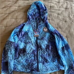 NWT Nike ACG Olympic Team Blue Patterned Windbreaker size M